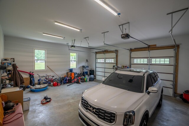 217 Rockhouse Rd, Hohenwald, TN 38462 - garage featuring a garage door opener