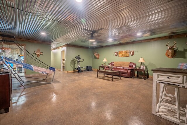 217 Rockhouse Rd, Hohenwald, TN 38462 - living area featuring a ceiling fan and finished concrete flooring