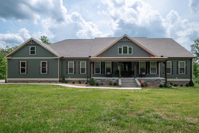 217 Rockhouse Rd, Hohenwald, TN 38462 - view of front of property featuring roof with shingles, covered porch, and a front yard