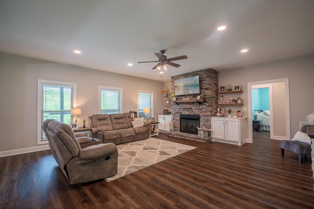 217 Rockhouse Rd, Hohenwald, TN 38462 - living room featuring recessed lighting, ceiling fan, dark wood finished floors, and a stone fireplace
