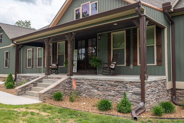 217 Rockhouse Rd, Hohenwald, TN 38462 - view of front of house with a porch and a shingled roof