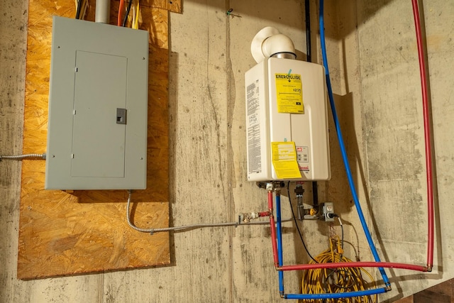 217 Rockhouse Rd, Hohenwald, TN 38462 - utility room featuring tankless water heater and electric panel
