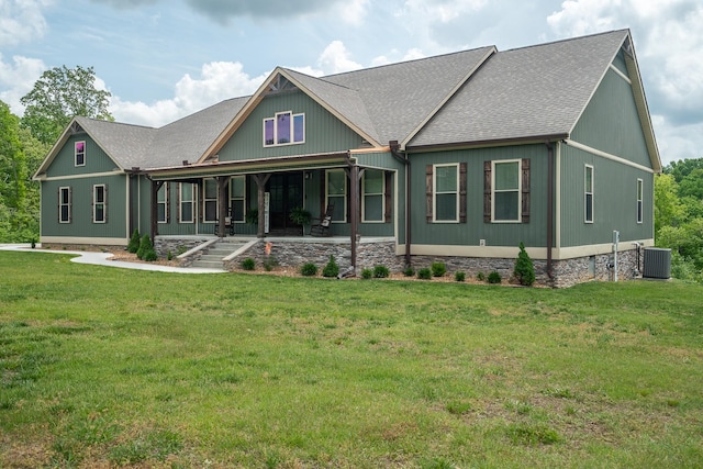 217 Rockhouse Rd, Hohenwald, TN 38462 - rear view of property featuring a porch, roof with shingles, central AC, and a lawn