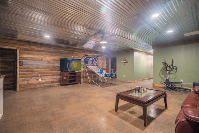 217 Rockhouse Rd, Hohenwald, TN 38462 - living room with ceiling fan, wood walls, recessed lighting, finished concrete floors, and wood ceiling