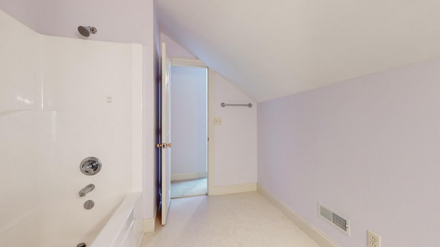 309 New Kent Ct, Tullahoma, TN 37388 - bathroom featuring visible vents, shower / bathtub combination, and vaulted ceiling