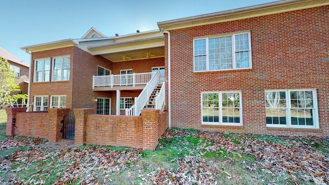 309 New Kent Ct, Tullahoma, TN 37388 - back of property featuring brick siding, ceiling fan, and fence