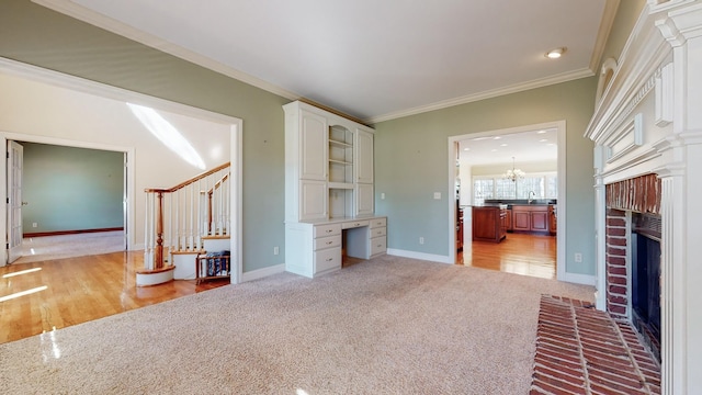 309 New Kent Ct, Tullahoma, TN 37388 - unfurnished living room with crown molding, light carpet, a brick fireplace, baseboards, and stairway