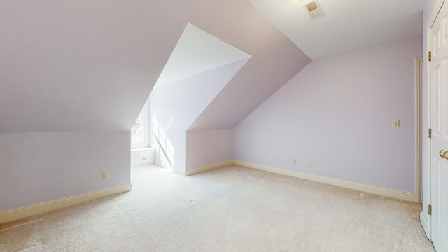 309 New Kent Ct, Tullahoma, TN 37388 - bonus room featuring baseboards, carpet, and vaulted ceiling