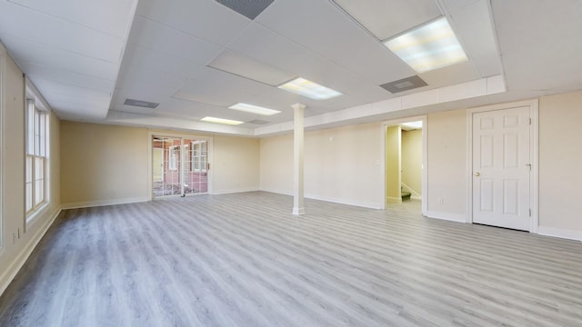 309 New Kent Ct, Tullahoma, TN 37388 - unfurnished room featuring baseboards, a drop ceiling, and wood finished floors