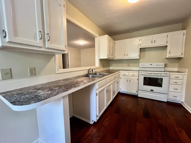 kitchen featuring electric range, dark wood finished floors, white cabinetry, and a sink