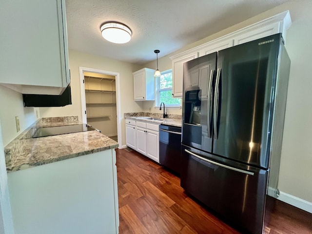 kitchen featuring white cabinets, black dishwasher, stainless steel refrigerator with ice dispenser, and dark wood-style floors