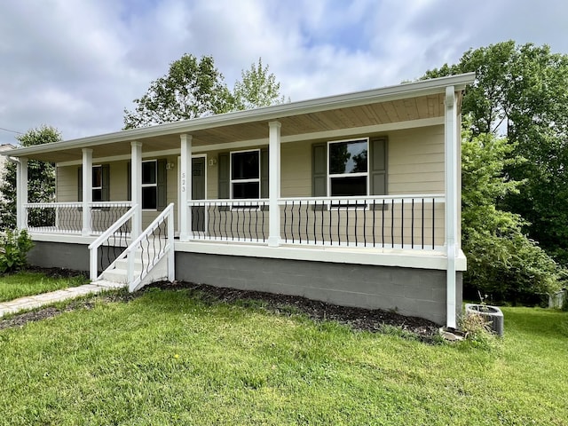 single story home with central AC unit, a porch, and a front lawn