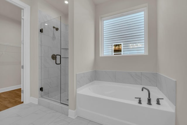 1105 Codah Dr, Mount Juliet, TN 37122 - full bath featuring a walk in closet, a stall shower, a bath, and marble finish floor