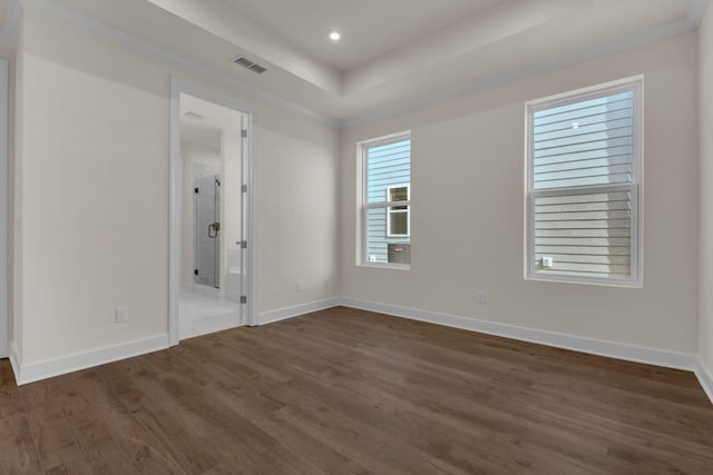1105 Codah Dr, Mount Juliet, TN 37122 - unfurnished bedroom featuring a raised ceiling, ensuite bath, baseboards, visible vents, and dark wood-style floors