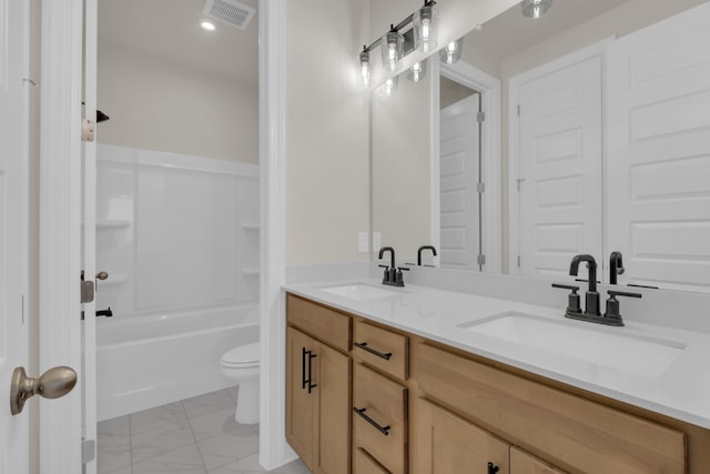 1105 Codah Dr, Mount Juliet, TN 37122 - bathroom featuring double vanity, visible vents, a sink, and marble finish floor