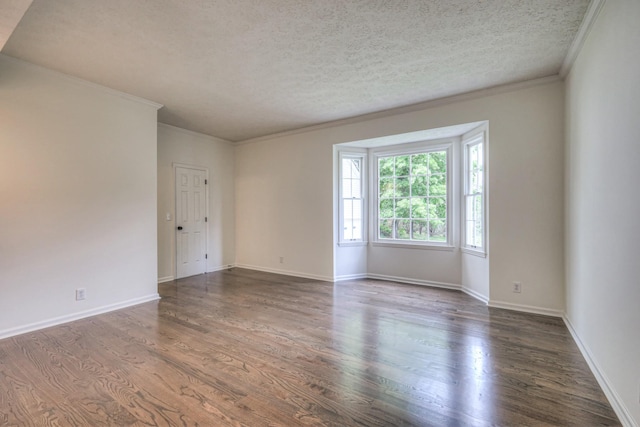 601 Foxborough Sq W, Brentwood, TN 37027 - unfurnished room featuring ornamental molding, dark wood-type flooring, a textured ceiling, and baseboards