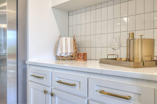 601 Foxborough Sq W, Brentwood, TN 37027 - bathroom featuring decorative backsplash and vanity