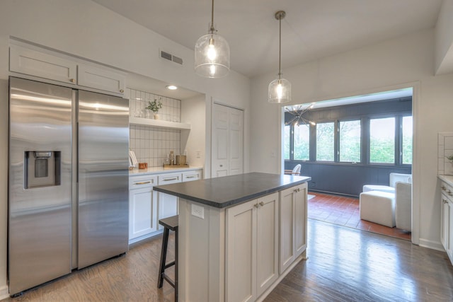 601 Foxborough Sq W, Brentwood, TN 37027 - kitchen with stainless steel refrigerator with ice dispenser, open shelves, decorative backsplash, dark wood finished floors, and white cabinetry