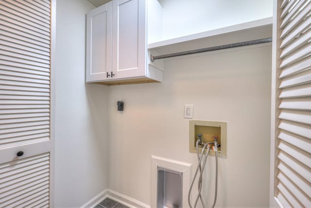 601 Foxborough Sq W, Brentwood, TN 37027 - washroom with washer hookup, cabinet space, electric dryer hookup, tile patterned flooring, and baseboards