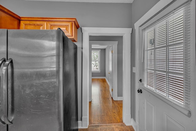 2408 Elliott Dr, Old Hickory, TN 37138 - kitchen with stainless steel fridge, baseboards, and wood finished floors