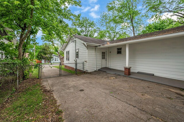 2408 Elliott Dr, Old Hickory, TN 37138 - rear view of house with fence and a gate