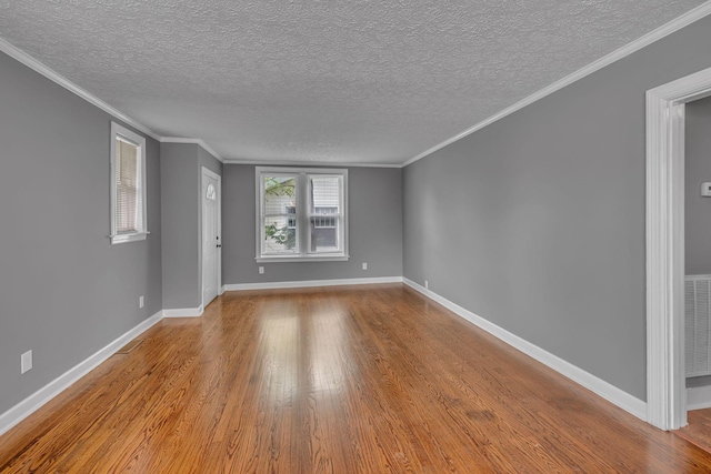 2408 Elliott Dr, Old Hickory, TN 37138 - unfurnished living room featuring a textured ceiling, baseboards, and wood finished floors