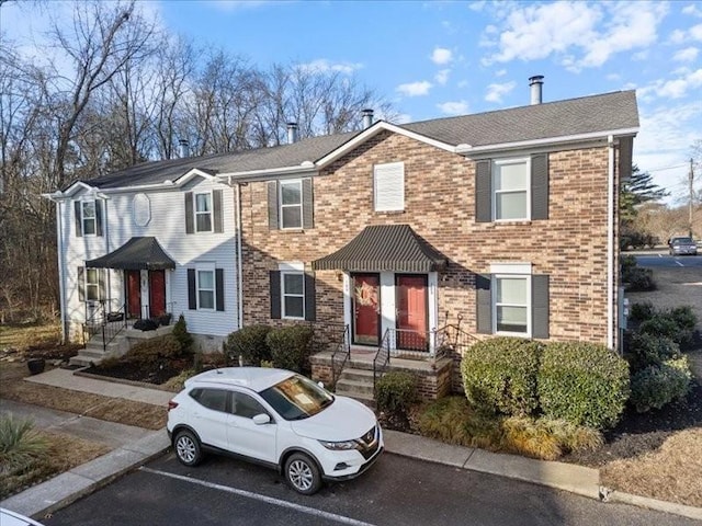 180 Edgewood Dr, Hendersonville, TN 37075 - view of front of property with brick siding and uncovered parking