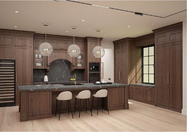 0 Old Pond Ln, Dickson, TN 37055 - kitchen with light wood-style floors, a sink, backsplash, and dark countertops