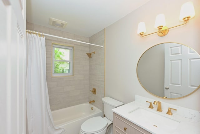 102 Moore Ave, Portland, TN 37148 - full bath with vanity, shower / bath combo, toilet, and visible vents