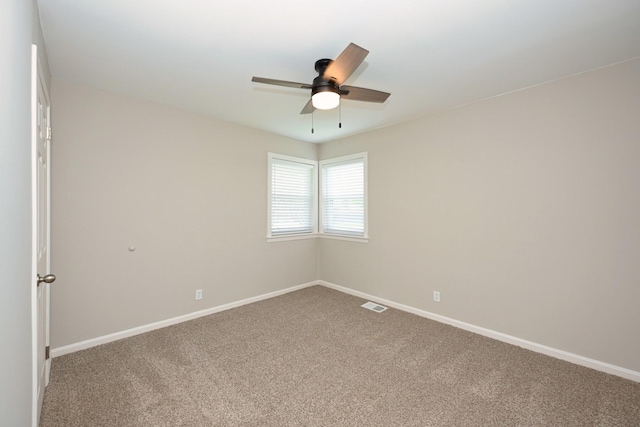102 Moore Ave, Portland, TN 37148 - carpeted spare room with baseboards, a ceiling fan, and visible vents
