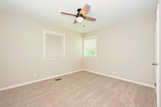 102 Moore Ave, Portland, TN 37148 - spare room with baseboards, ceiling fan, carpet, and visible vents