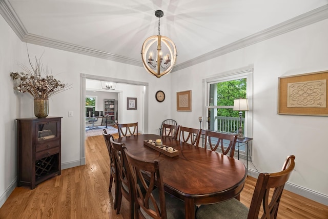 6437 Arno Rd, College Grove, TN 37046 - dining room featuring a chandelier, ornamental molding, light wood finished floors, and baseboards