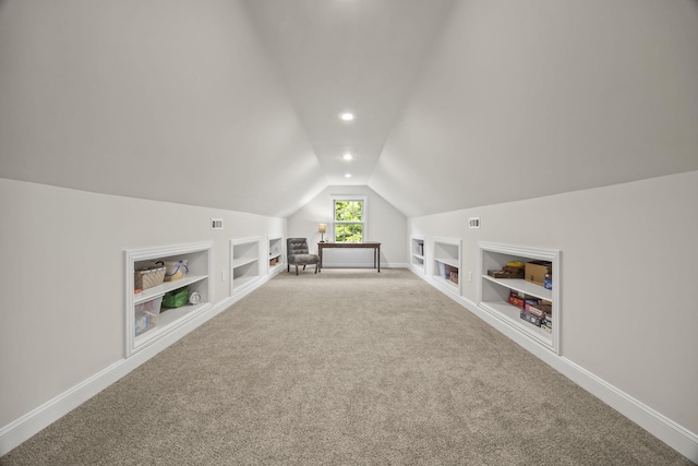 6437 Arno Rd, College Grove, TN 37046 - bonus room with built in shelves, vaulted ceiling, carpet flooring, and recessed lighting