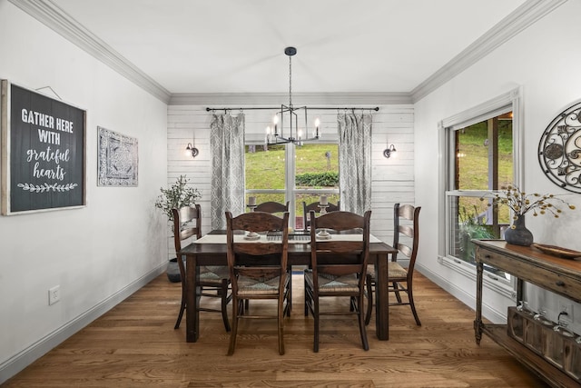 6437 Arno Rd, College Grove, TN 37046 - dining space featuring crown molding, a chandelier, wood finished floors, and baseboards