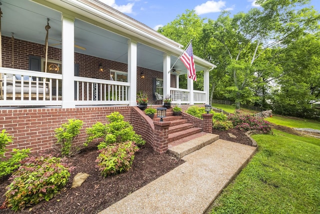 6437 Arno Rd, College Grove, TN 37046 - entrance to property with brick siding, a porch, a lawn, and ceiling fan