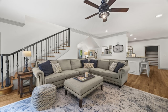 6437 Arno Rd, College Grove, TN 37046 - living area with crown molding, stairway, ceiling fan, light wood finished floors, and recessed lighting