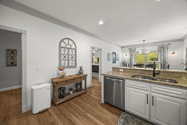 6437 Arno Rd, College Grove, TN 37046 - kitchen with dishwasher, crown molding, baseboards, wood finished floors, and a sink