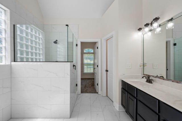 990 Iron Hill Rd, Burns, TN 37029 - full bath featuring marble finish floors, a tile shower, double vanity, and lofted ceiling