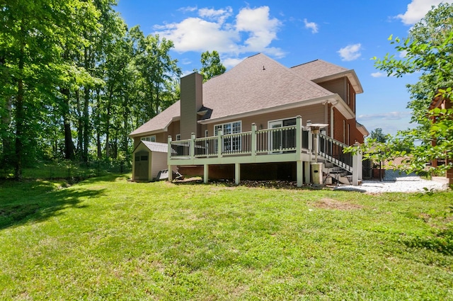 990 Iron Hill Rd, Burns, TN 37029 - back of property featuring a deck, stairs, roof with shingles, and a chimney