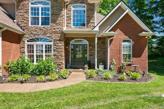 990 Iron Hill Rd, Burns, TN 37029 - property entrance with a yard and stone siding