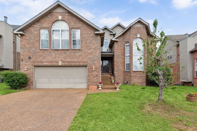5512 Oak Chase Dr, Antioch, TN 37013 - view of front of property featuring a garage, concrete driveway, a front lawn, and brick siding