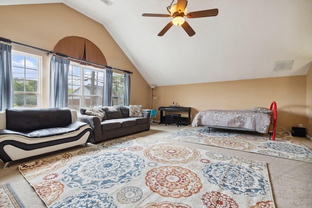 5512 Oak Chase Dr, Antioch, TN 37013 - carpeted living area featuring visible vents, a ceiling fan, vaulted ceiling, and a wealth of natural light
