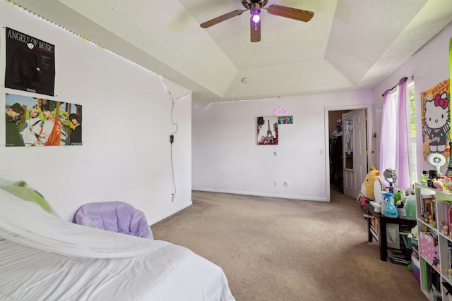 5512 Oak Chase Dr, Antioch, TN 37013 - carpeted bedroom with a walk in closet, baseboards, a ceiling fan, and a tray ceiling