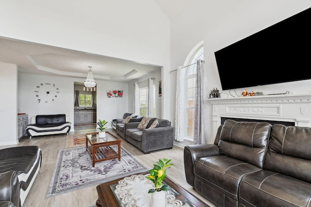 5512 Oak Chase Dr, Antioch, TN 37013 - living room with baseboards, wood finished floors, and a raised ceiling