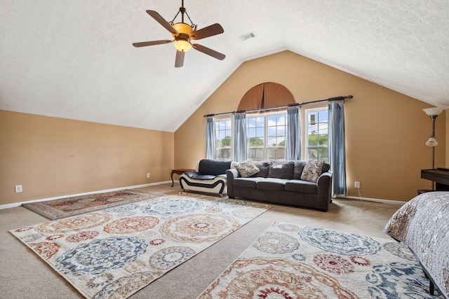 5512 Oak Chase Dr, Antioch, TN 37013 - carpeted living room featuring baseboards, a ceiling fan, a textured ceiling, and vaulted ceiling