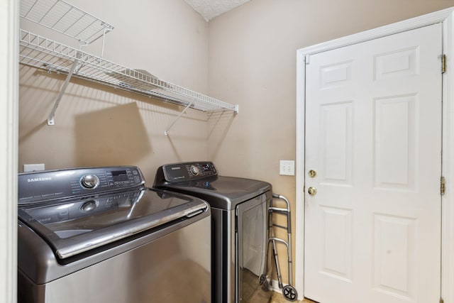 5512 Oak Chase Dr, Antioch, TN 37013 - laundry room featuring washing machine and clothes dryer and laundry area