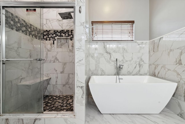 5512 Oak Chase Dr, Antioch, TN 37013 - full bath with a freestanding bath, tile walls, a stall shower, and marble finish floor