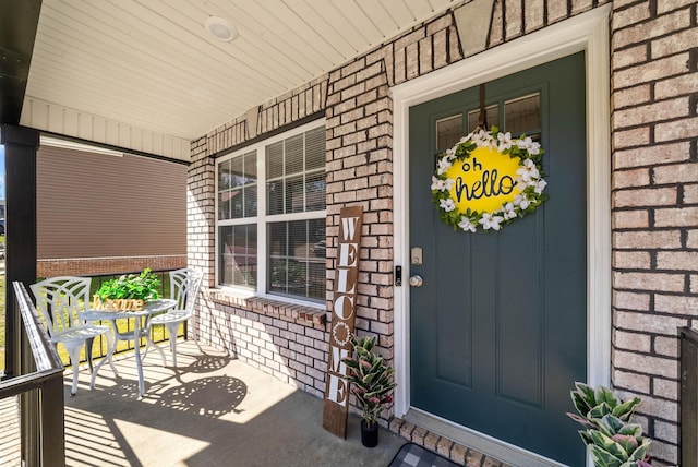 1145 Racker Dr, Clarksville, TN 37043 - view of exterior entry featuring a porch and brick siding