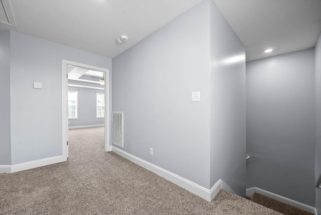 1145 Racker Dr, Clarksville, TN 37043 - hall with visible vents, baseboards, attic access, recessed lighting, and carpet flooring