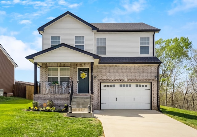 1145 Racker Dr, Clarksville, TN 37043 - view of front of home featuring covered porch, driveway, fence, a front lawn, and an attached garage